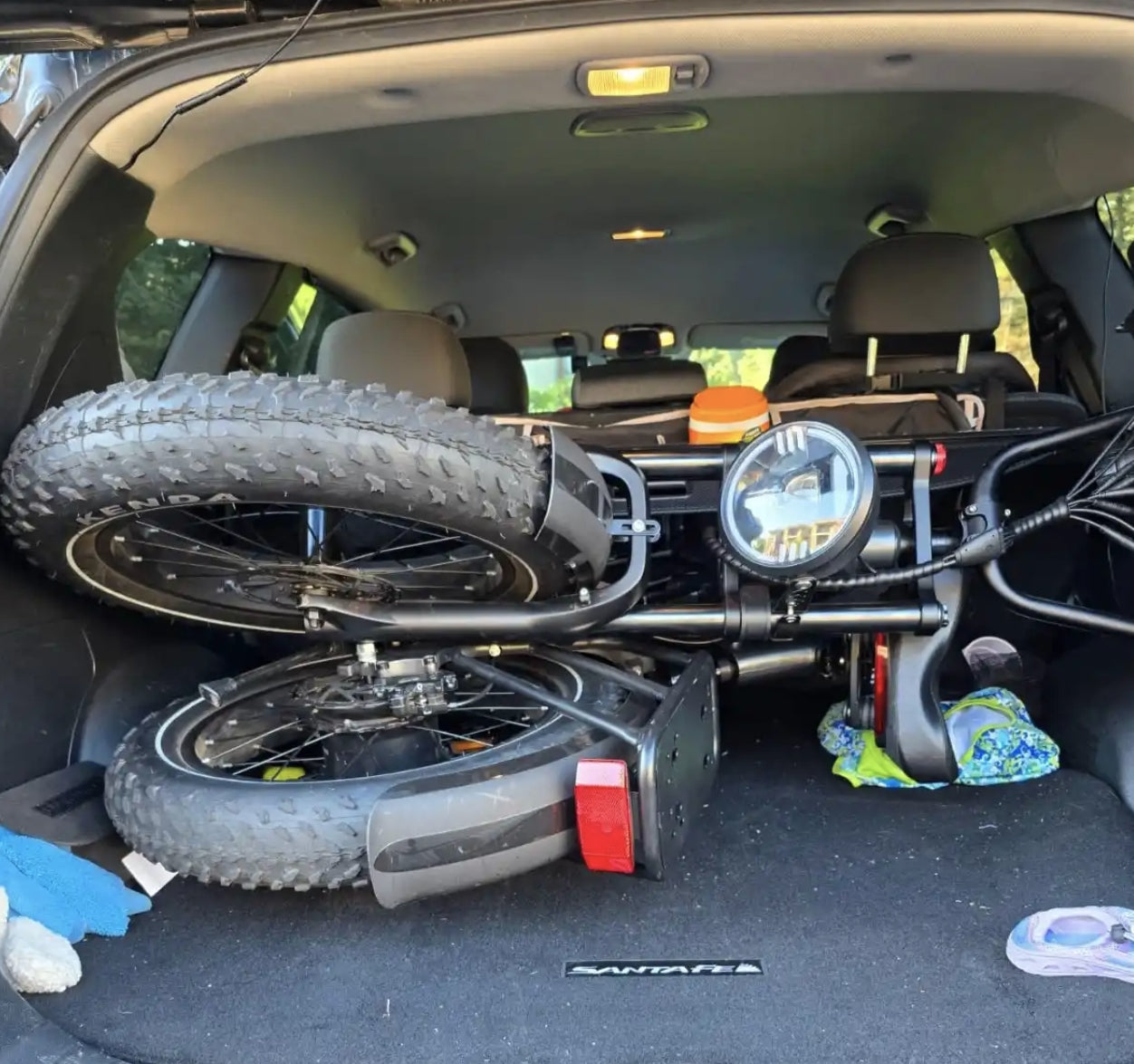 X50 with panniers near the beach