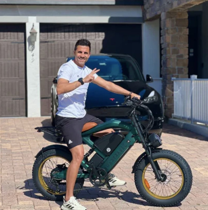 OUXI V8 parked at a city overlook