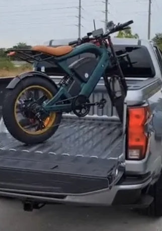 OUXI V8 parked at a city overlook